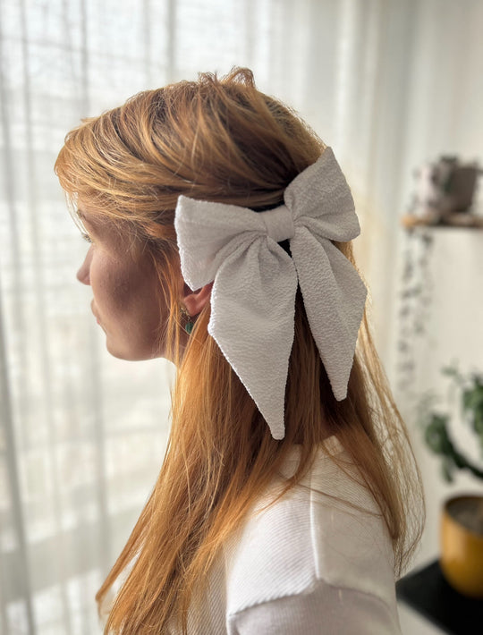 White bow with hairclip